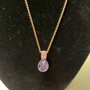 N16. Purple stone necklace with purple rhinestone accents.